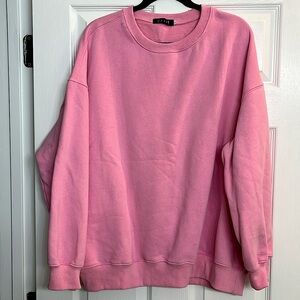 Bright pink crew neck oversized sweater